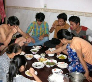 University Students Eating Common Meal