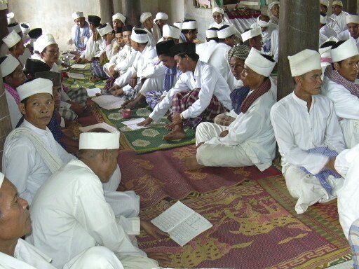 Sre Prey Area Mosque with Traditional Cham at Prayer